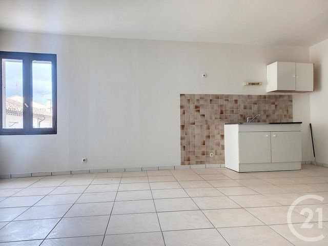 Appartement F1 à louer - 2 pièces - 40.9 m2 - MARAUSSAN - 34 - LANGUEDOC-ROUSSILLON - Century 21 Comminges Immobilier